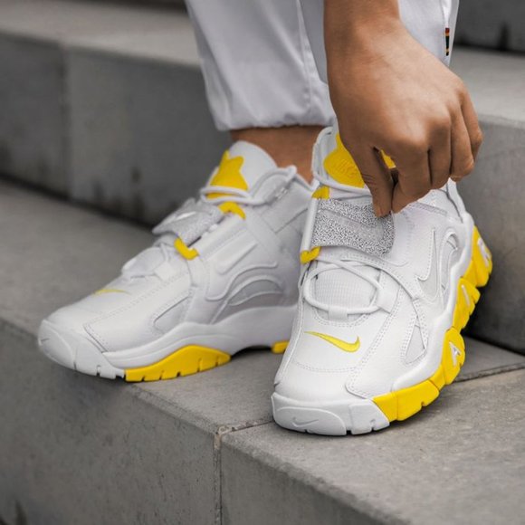 white and yellow nike barrage